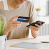 Asian woman using smartphone buying online shopping